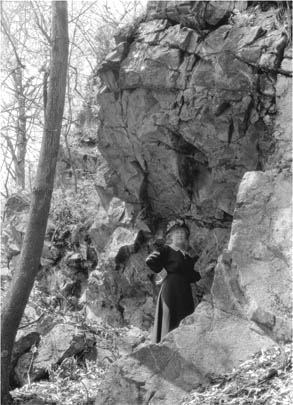 L.W.G. [Mrs. Gleason]  in Thoreau's cave at Lee's Cliff