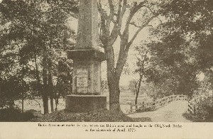 Battle Monument marks 
	the spot where the British stood and fought at the Old North Bridge on the nineteenth of April, 1775; 