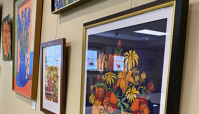 gallery of artwork on the Fowler Meeting Room wall banner